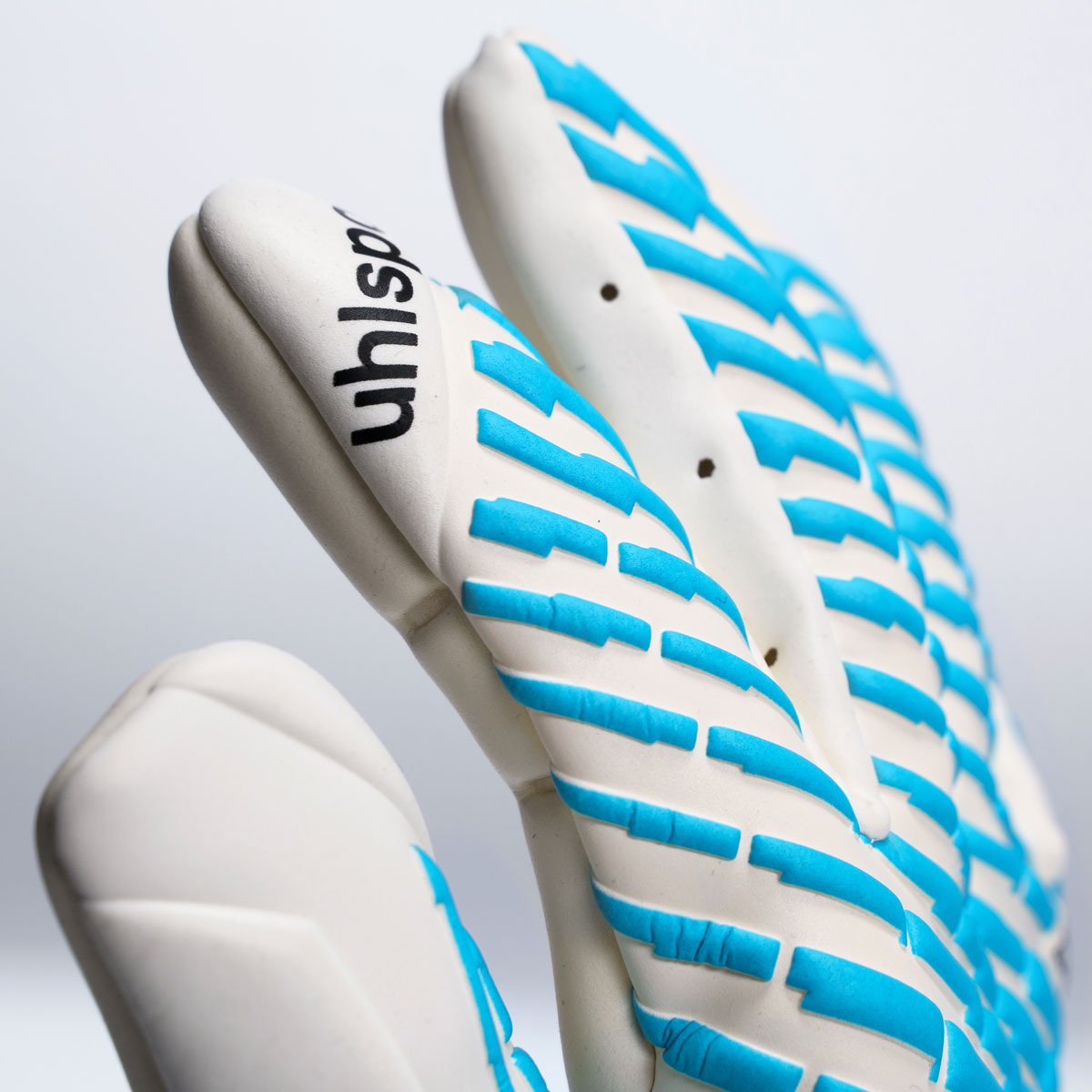 101137901_ABSOLUTGRIP_HN_CloseUp_01_1200x1200px GUANTO portiere CYBERTEC ABSOLUTGRIP HN UHLSPORT