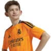 IT5177_7_APPAREL_On Model_Detail View 1_white Maglia AWAY 24/25 REAL MADRID JUNIOR
