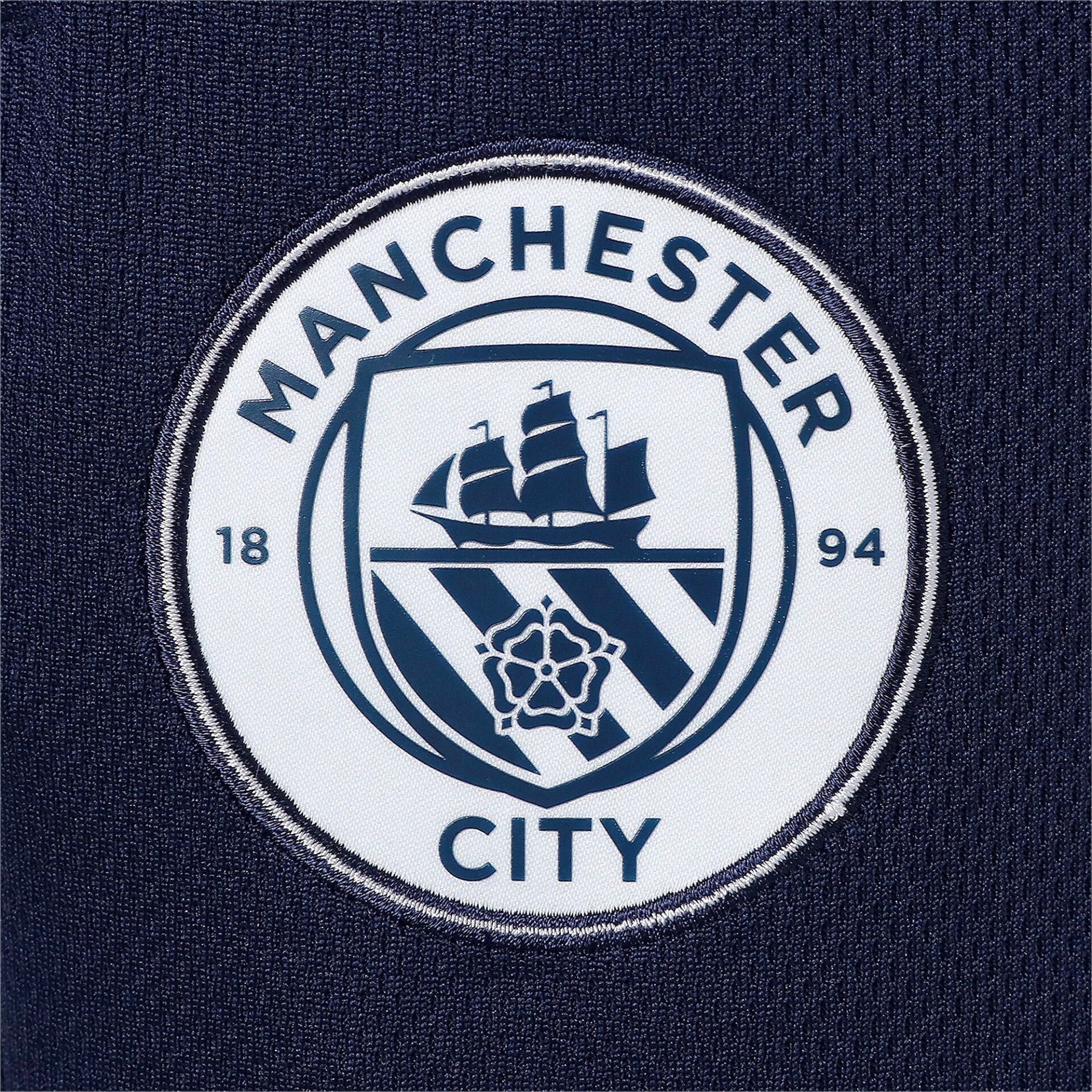 puma__pum-765204-05__detailview05 Pantalone da calcio Manchester City ICONIC dettaglio logo