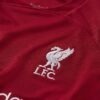 Maglia junior LIVERPOOL FC STADIUM HOME 22/23 LOGO SQUADRA